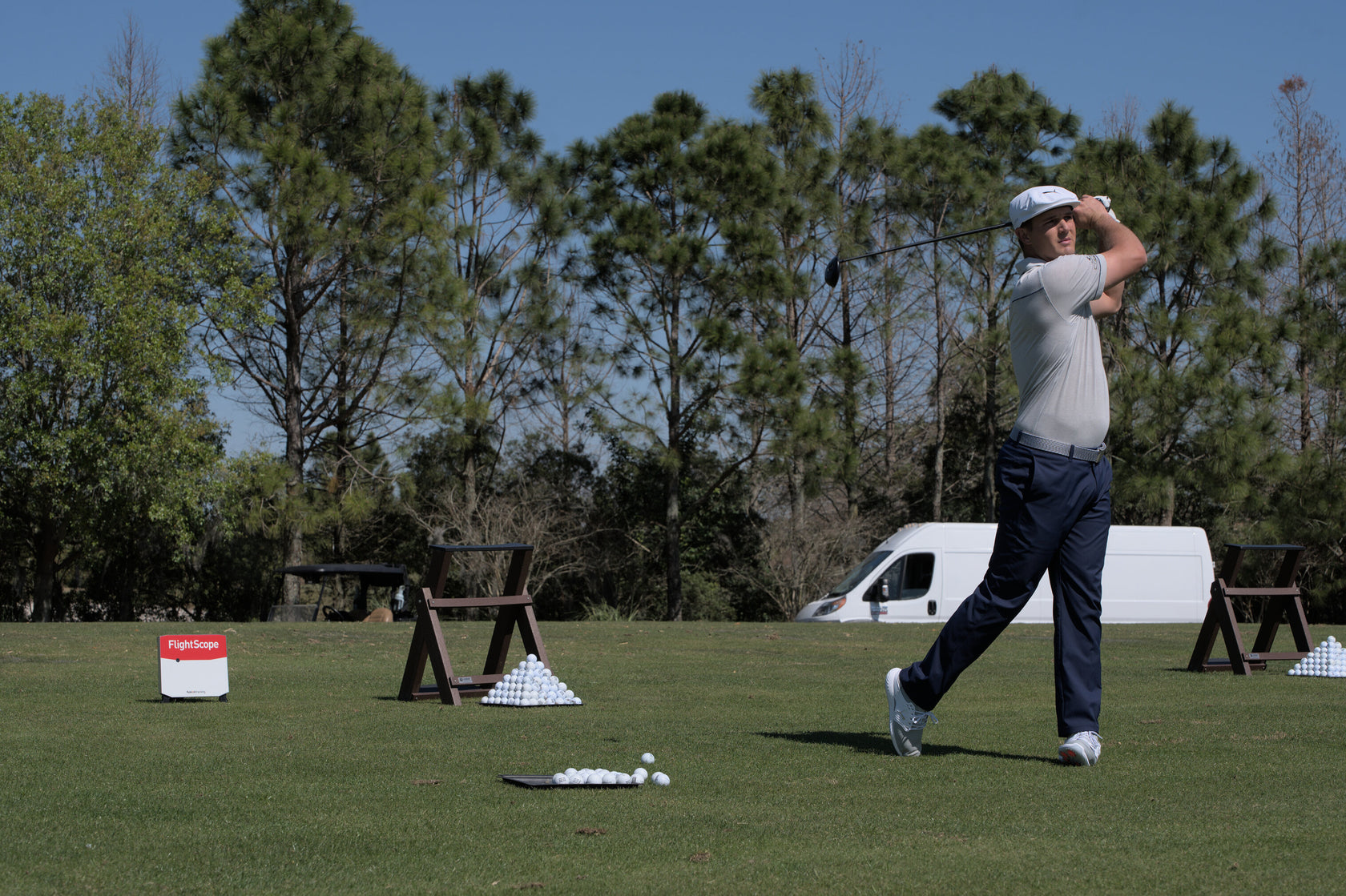 Man playing Golf with Flight Scope | MIA Golf Technology